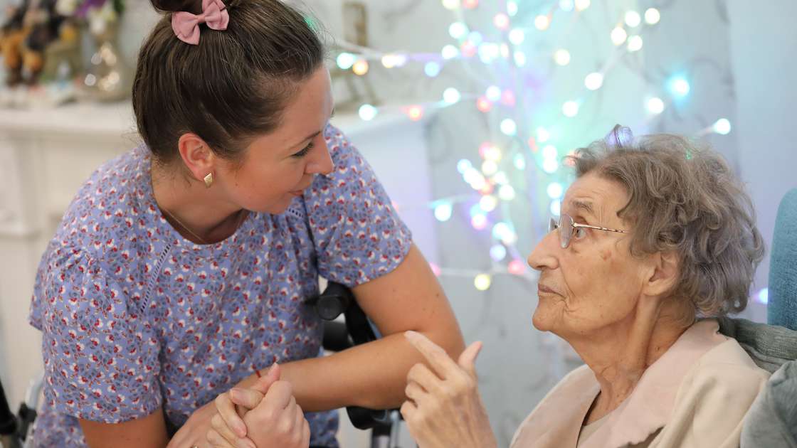 CCH Image of carer and resident engaging in conversation