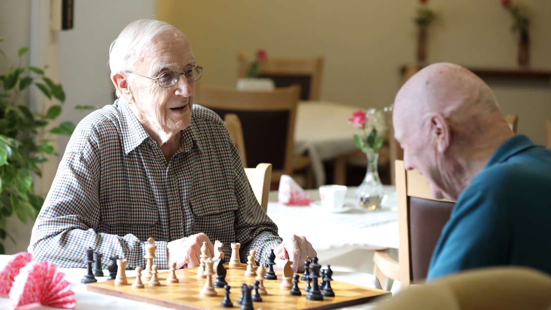 CCH Image of residents playing chess