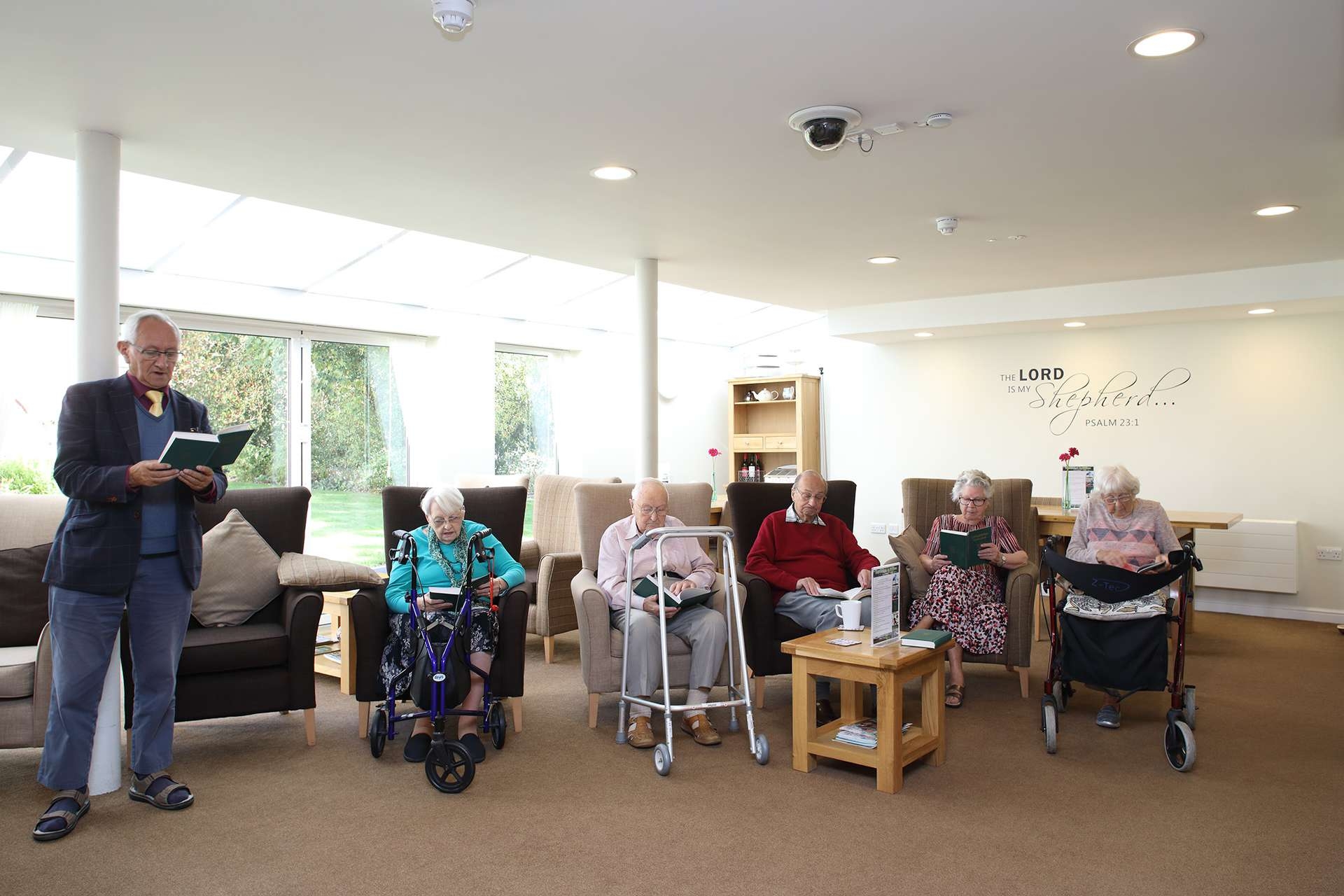 CCH Image Displaying residents sat in the communal area engaging with one another