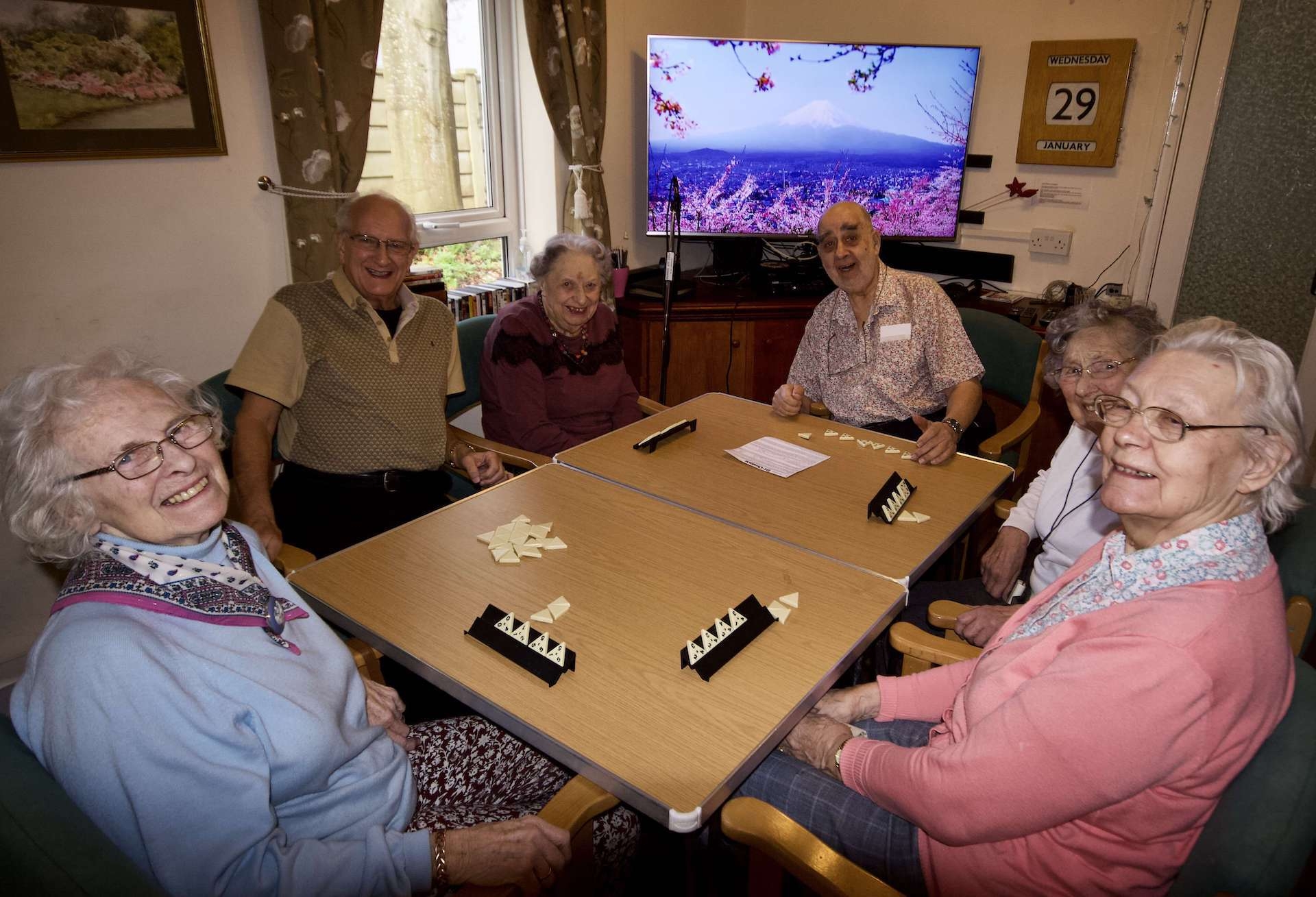 CCH Fairhaven Gallery Image displaying a group shot of residents playing board games