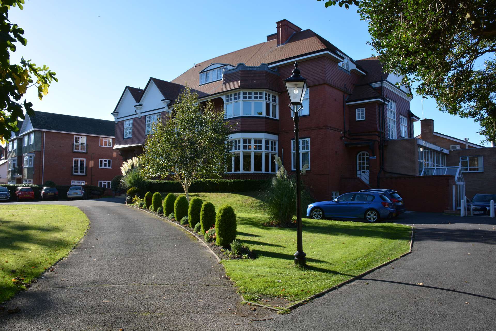 CCH Image displaying an outside wide shot of the front garden at Garswood