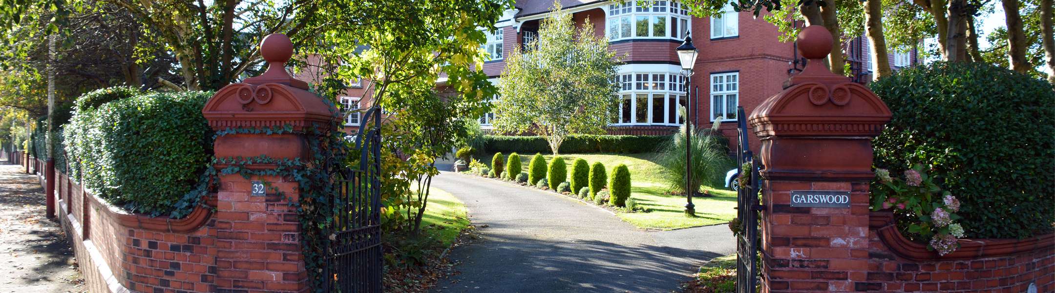 CCH Image showing an outside shot of the gorgeous gates at Garswood Care Home