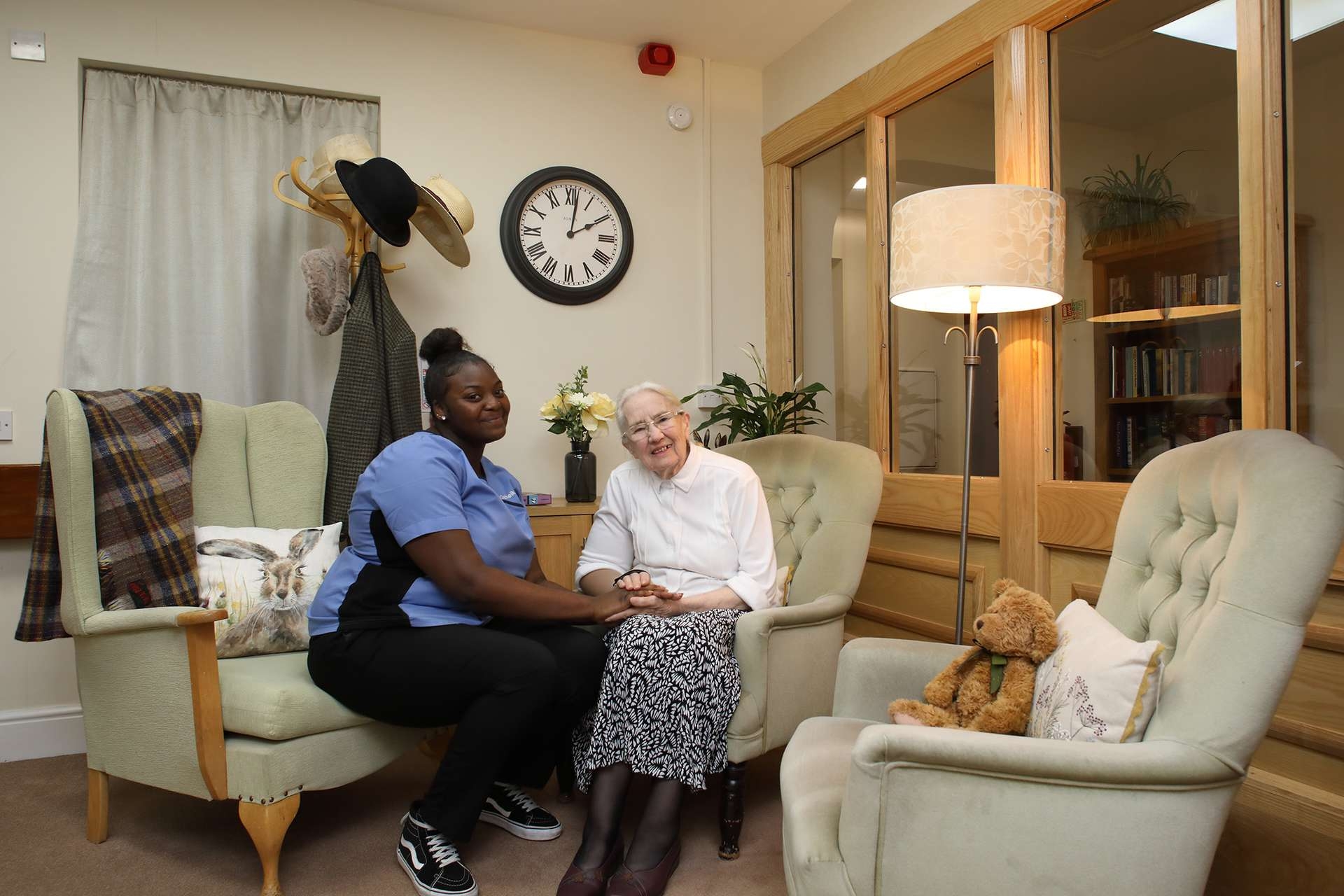 CCH Kingsleigh Gallery Image showing a resident and a carer engaging in conversation