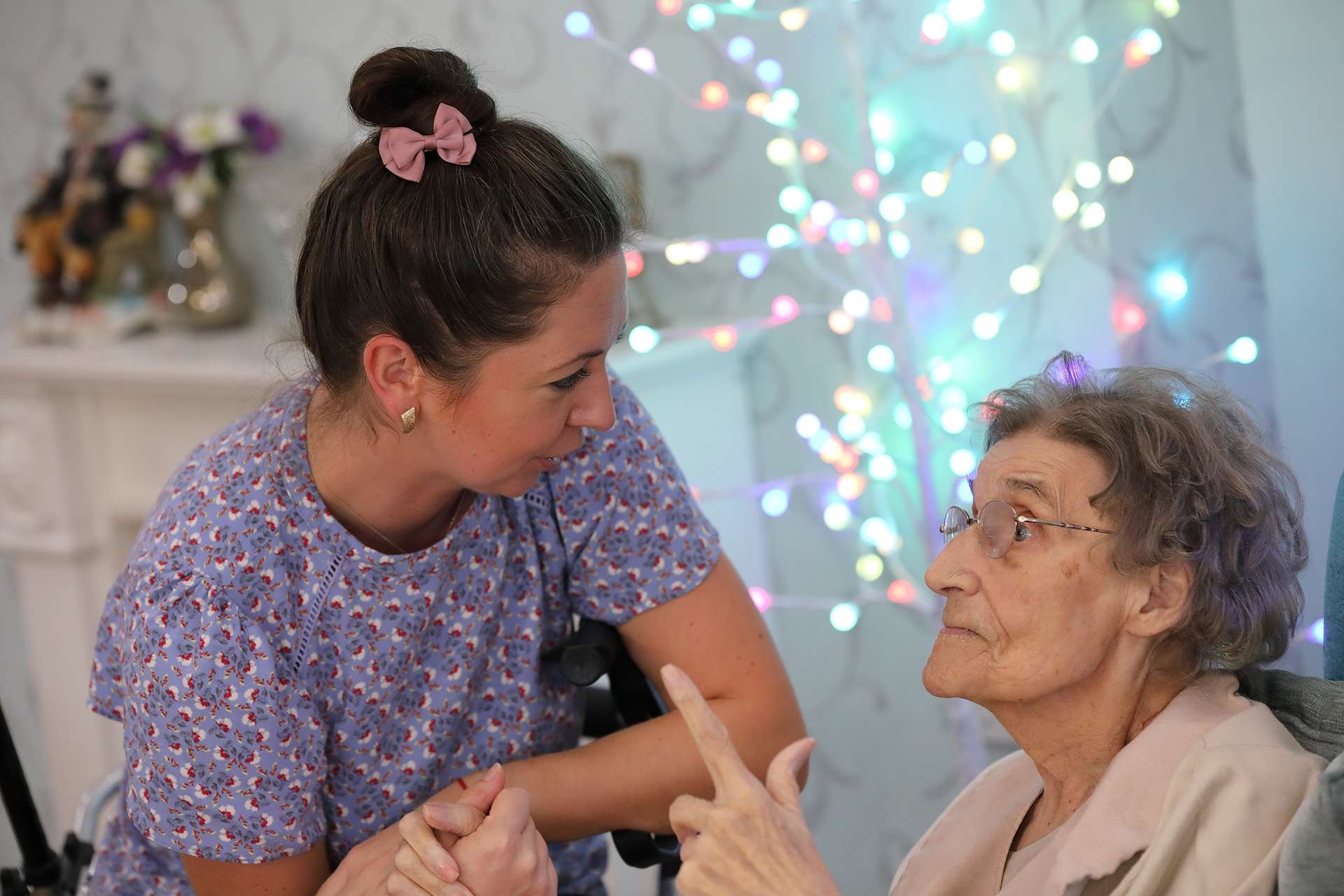 CCH Gallery Image displaying a carer engaging in conversation with a carer