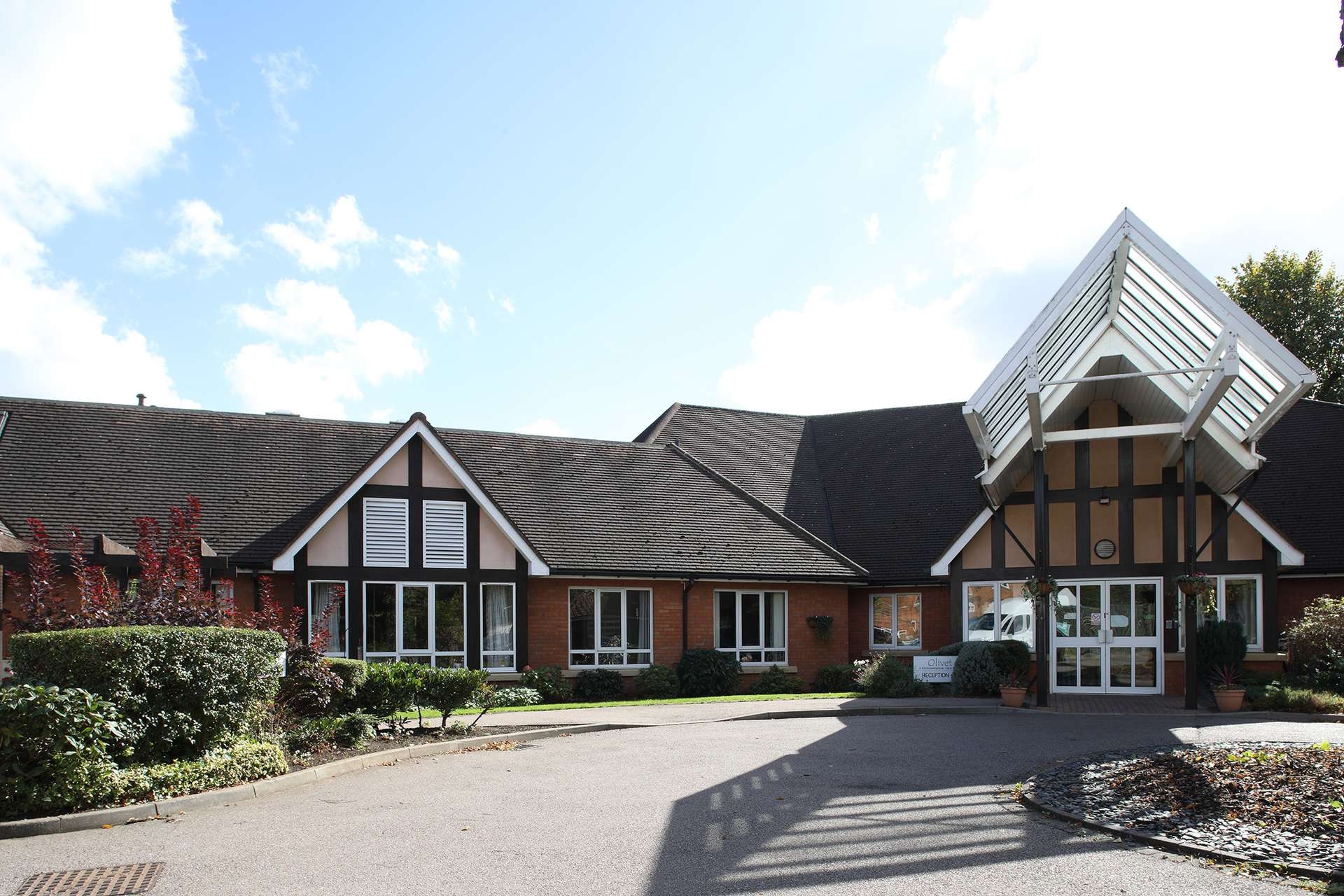 CCH Gallery Image showing an outside shot of the care home in the summer sun